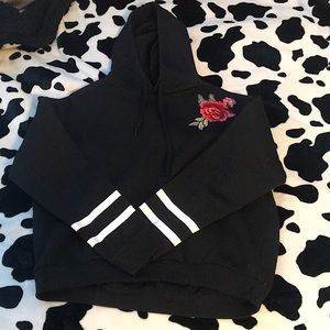 black hoodie with rose